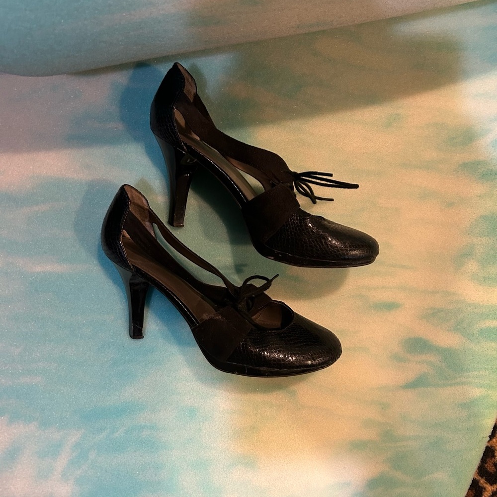 Fergalicious size 9 black platform heels.